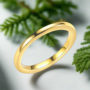 Gold ring on a white background