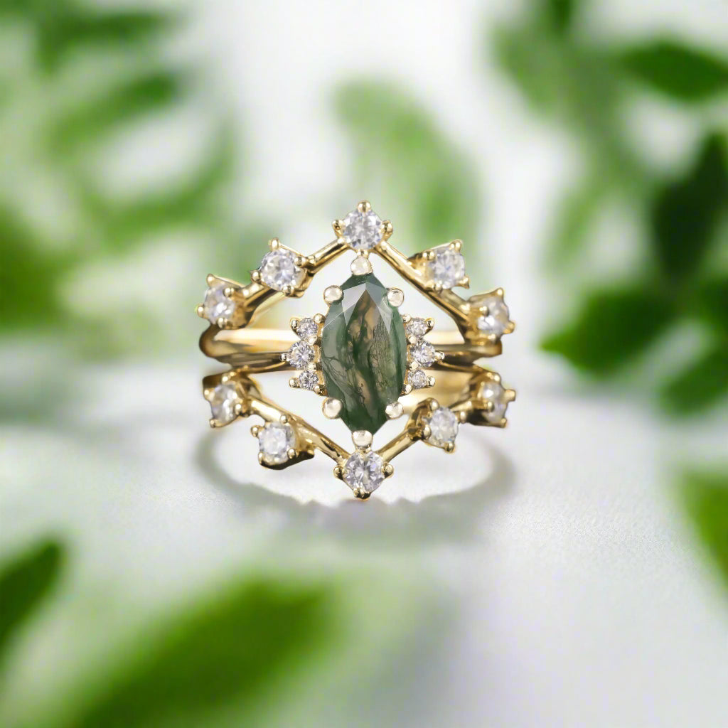 Gold ring with green gemstone and diamonds on a dark background