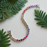 Multicolored gemstone bracelet on a white background