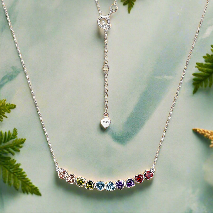 Necklace with colorful gemstones on a white background