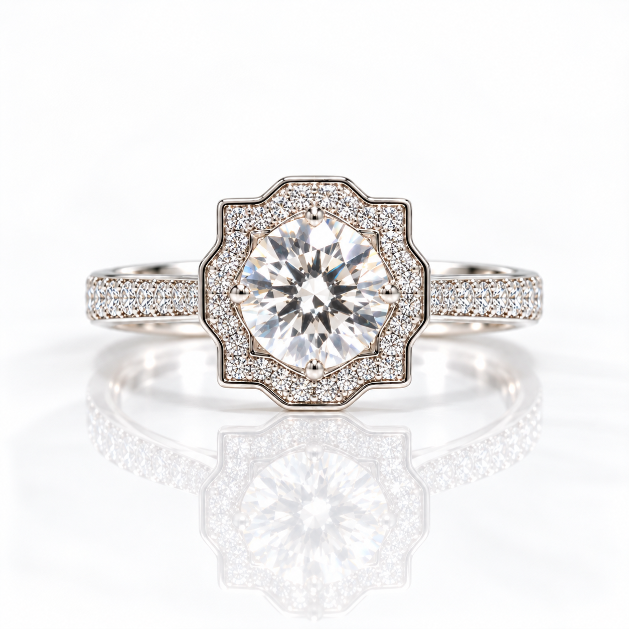 An ornate octagonal diamond ring with a large round center stone surrounded by a halo of smaller stones, set on a pavé band, shown on a reflective white surface.