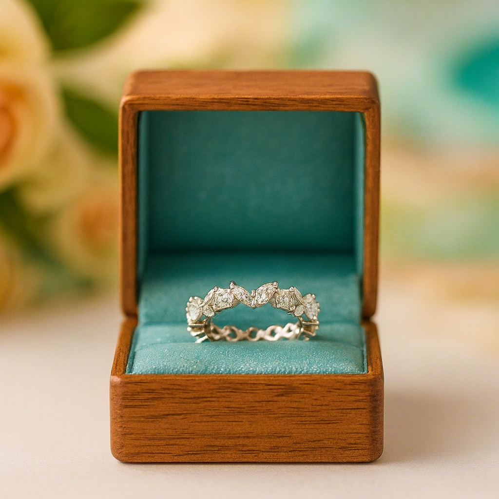 Diamond ring in a wooden box with a floral background