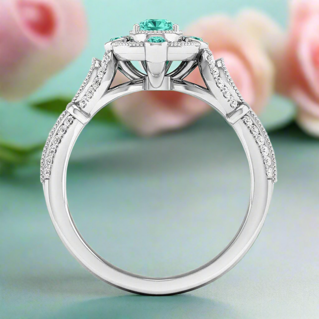 Elegant ring with a central turquoise gemstone and diamond accents on a white background