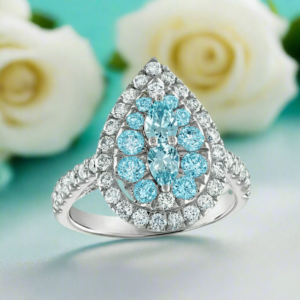 Elegant ring with blue gemstones and diamonds on a soft focus background