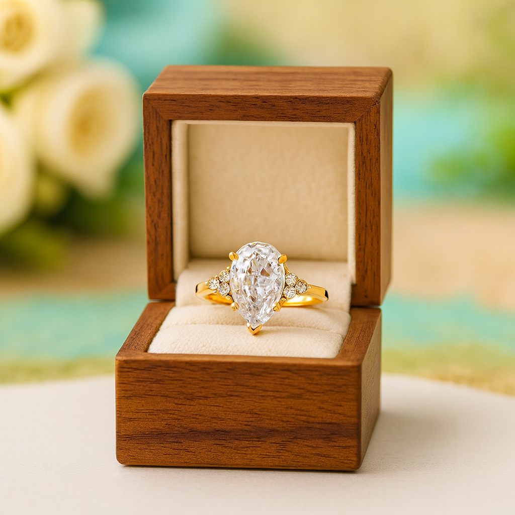 Gold diamond ring in a wooden box with a blurred floral background