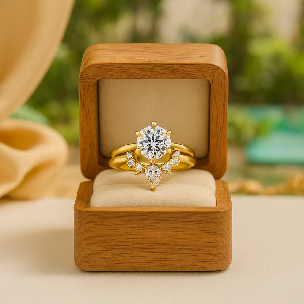 Gold ring with a large diamond in a wooden box against a blurred natural background