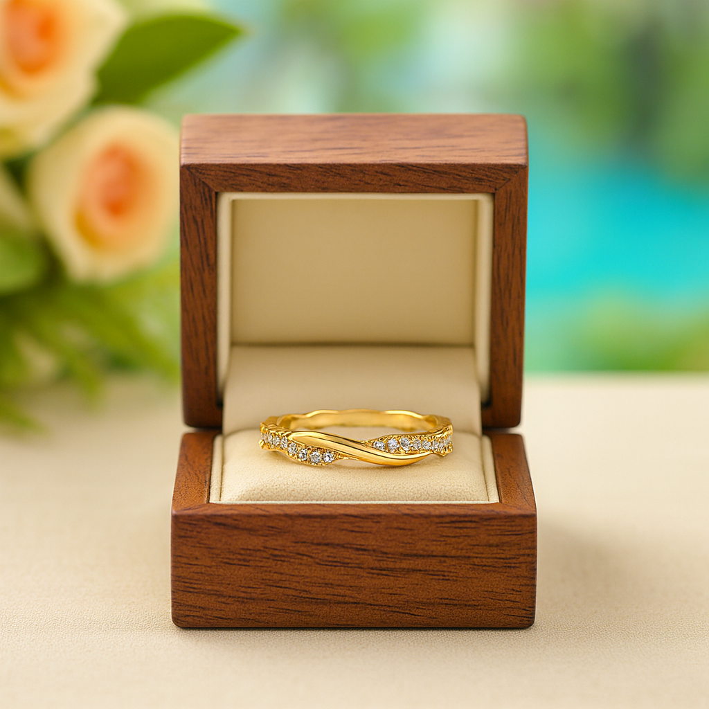 Gold ring with diamonds in a wooden box against a blurred floral background