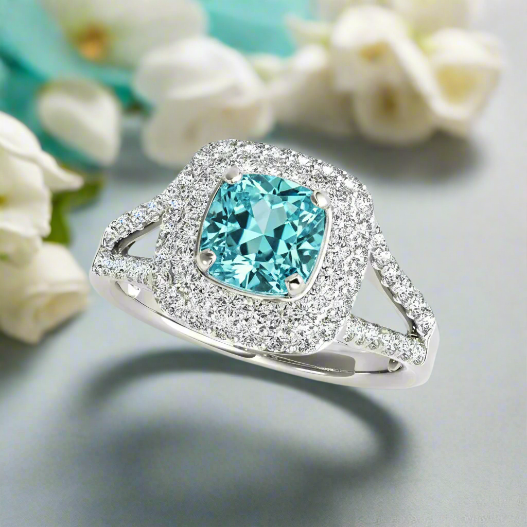 Ring with a blue gemstone and diamond-studded band on a light background