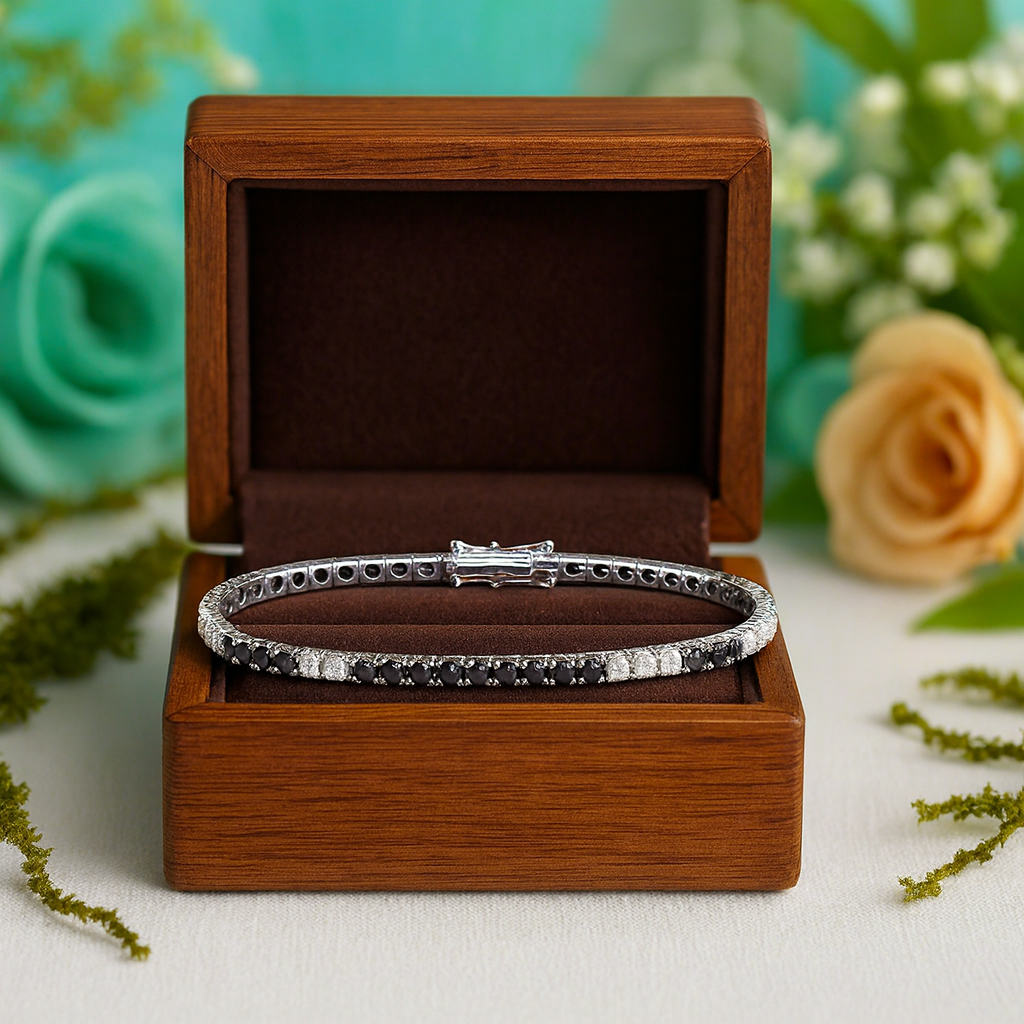 Silver bracelet in a wooden box with flowers in the background