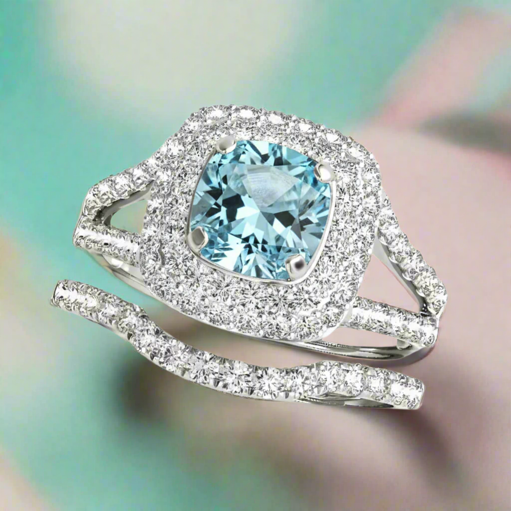 Silver ring with a blue gemstone on a white background