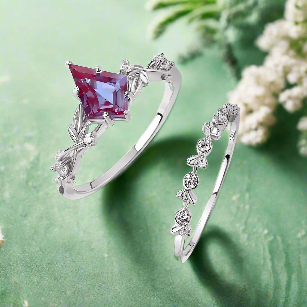 Two silver rings with gemstones on a white background